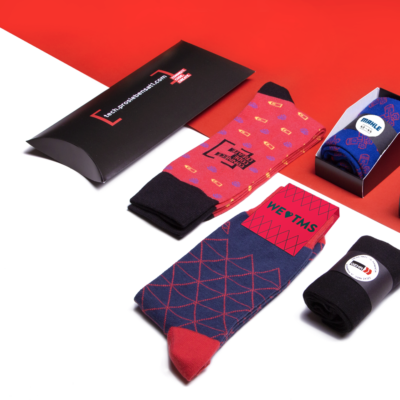 Bringen Sie Ihr individuelles Firmenlogo und Design auf Socken - das perfekte Werbegeschenk!
